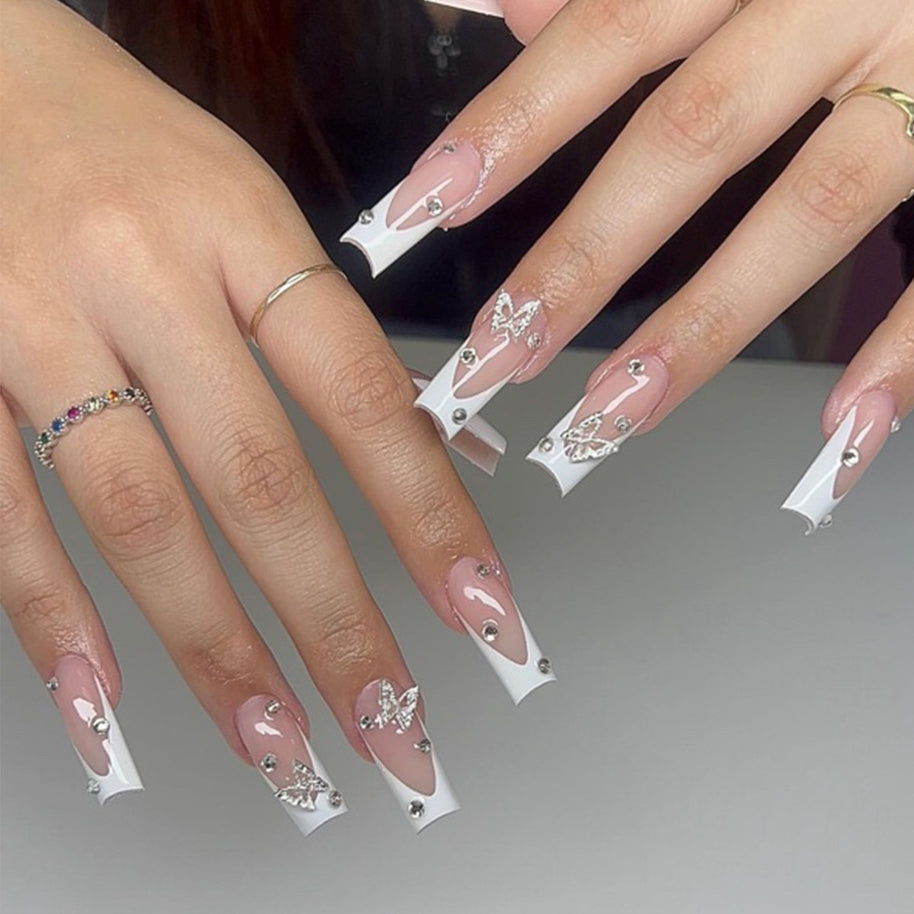 Elegant White French Tips with 3D Butterfly Decor
